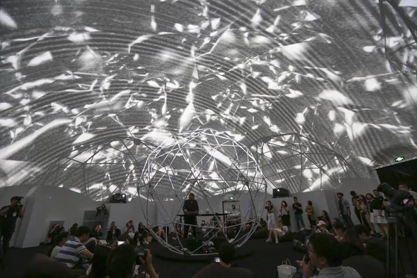 Visitors Lie Enjoy Electronic Music Performance Illuminated Tracks Projected Sphere — Stock Photo, Image