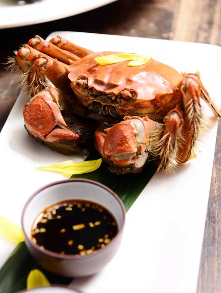 A steamed hairy crab is served at a restaurant in Beijing, China, 26 August 2013.