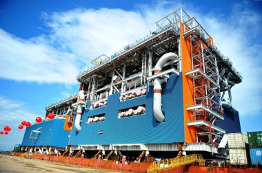 View of the last two module fabrications performed by Qingdao McDermott Wuchuan (QMW) fabrication facility for Yamal LNG, a liquefied natural gas plant being built northeast of the Yamal Peninsula in Russia, in Qingdao city, east China's Shandong pro clipart