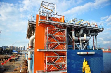 View of one of the last two module fabrications performed by Qingdao McDermott Wuchuan (QMW) fabrication facility for Yamal LNG, a liquefied natural gas plant being built northeast of the Yamal Peninsula in Russia, in Qingdao city, east China's Shand clipart