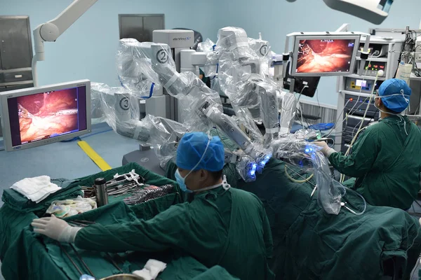 Surgical Robot Equipped Cameras Carrying Out Its First Cardiac Surgery Stock Photo