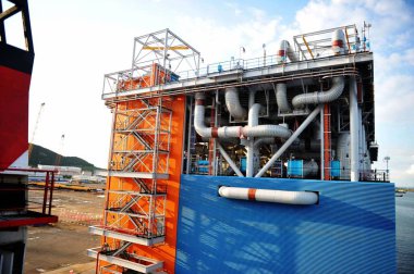 View of one of the last two module fabrications performed by Qingdao McDermott Wuchuan (QMW) fabrication facility for Yamal LNG, a liquefied natural gas plant being built northeast of the Yamal Peninsula in Russia, in Qingdao city, east China's Shand clipart