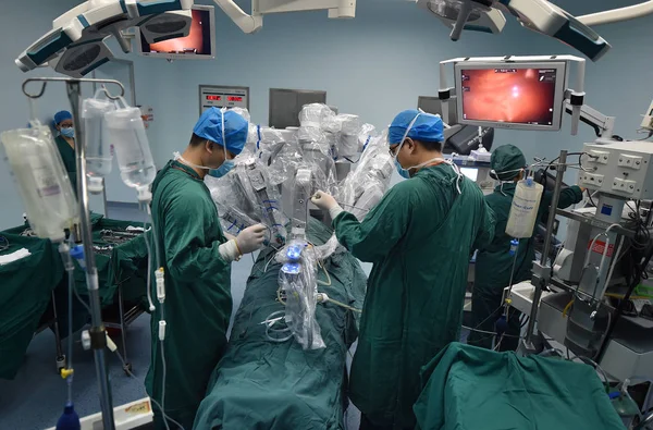 Surgical Robot Equipped Cameras Carrying Out Its First Cardiac Surgery Stock Photo