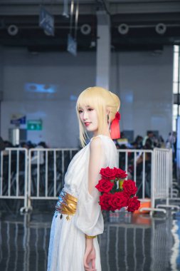 A cosplayer poses during the Hangzhou Cosplay Cultural Festival in Hangzhou city, east China's Zhejiang province, 30 December 2018 clipart