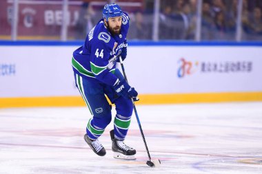 Erik Gudbranson of Vancouver Canucks competes against Los Angeles Kings during the second NHL China preseason hockey game at Wukesong Arena in Beijing, China, 23 September 2017 clipart