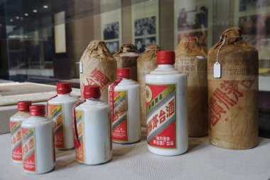View of bottles of Kweichow Moutai liquor displayed at the Wine Culture Museum of Guizhou in Zunyi city, southwest China's Guizhou province, 17 August 2017 clipart