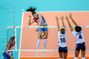 Lucia Bosetti, left, and Sara Bonifacio of Italy spike against Tijana Boskovic of Serbia during their match of the FIVB Volleyball World Grand Prix Finals 2017 in Nanjing city, east China's Jiangsu province, 4 August 2017 clipart