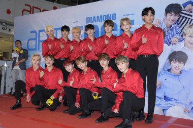 Members of South Korean boy group Seventeen, also stylized as SVT, attend a press conference for their concert 