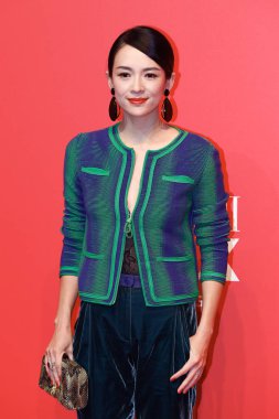 Chinese actress Zhang Ziyi poses as she arrives on the red carpet for the opening ceremony of Armani Box in Beijing, China, 8 September 2017. clipart