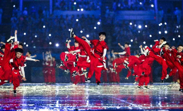 Dancers perform during the opening ceremony of the 13th Chinese National Games in Tianjin, China, 27 August 2017
