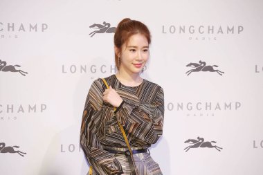 South Korean actress Yoo In-na attends a promotional event for Longchamp in Taipei, Taiwan, 30 August 2017. clipart