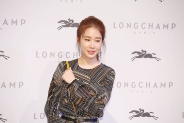South Korean actress Yoo In-na attends a promotional event for Longchamp in Taipei, Taiwan, 30 August 2017. clipart