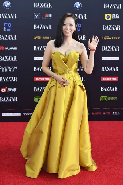 stock image Chinese singer Zhang Liangying poses as she arrives on the red carpet for the 2017 Bazaar Star Charity Night gala in Beijing, China, 9 September 2017.