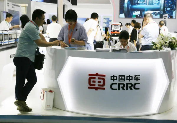 People visit the stand of CRRC (China Railway Rolling Stock Corp Ltd) during an exhibition in Beijing, China, 19 June 2017