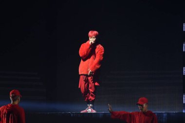 South Korean singer and Bigbang leader G-Dragon Kwon Ji-yong performs at his Art III motte concert in Taipei, Taiwan, 8 October 2017 clipart