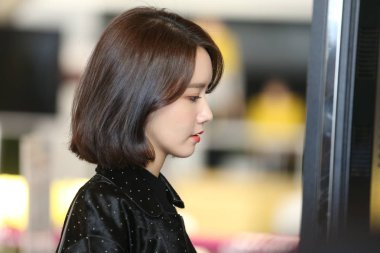 South Korean singer and actress Lim Yoon-ah, better known as Yoona, of South Korean pop group Girls' Generation arrives at Incheon International Airport in Seoul, South Korea, 19 October 2017. clipart