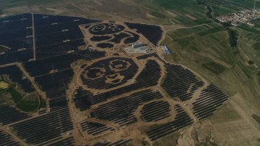 Aerial view of the world's first solar power station shaped like giant pandas in Datong city, north China's Shanxi province, 18 October 2017 clipart