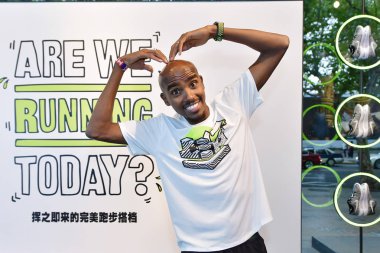 British Olympic distance running champion Mo Farah attends a running event at Nike+ Run Club in Shanghai, China, 19 October 2016. clipart