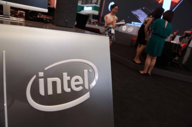 People visit the stand of Intel during the 14th China Digital Entertainment Expo, also known as ChinaJoy 2016, in Shanghai, China, 28 July 2016.  clipart