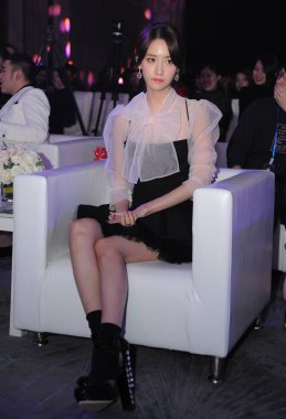 Lim Yoon-a of South Korean idol group Girls' Generation attends the 2016 CeCi Beauty Awards ceremony in Shanghai, China, 14 December 2016. clipart