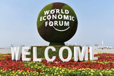 View of a decoration for the upcoming World Economic Forum Annual Meeting of the New Champions 2017, also known as the Summer Davos Forum 2017, in Dalian city, northeast China's Liaoning province, 25 June 2017 clipart