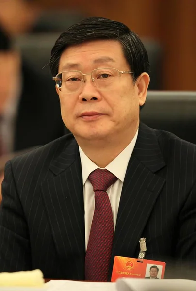 任天津市市长的黄兴国出席2013年3月9日在中国北京举行的第十二届全国人民代表大会第一次会议的小组会议 — 图库照片