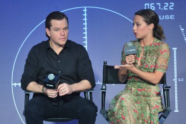 American actor Matt Damon, left, and Swedish actress Alicia Vikander attend a press conference for the China premiere of their new movie 