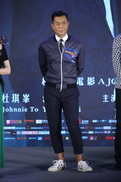 香港演员古天军在2016年6月20日于中国北京举行的电影 三人行 首映式新闻发布会上摆姿势 — 图库照片