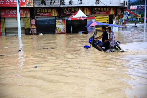 Chinese Men Ride Motorcycle Flooded Road Caused Heavy Rain Rongjiang — Stock Photo, Image