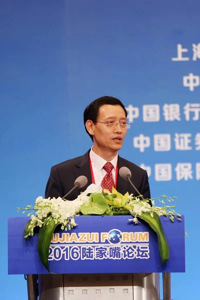 Wang Yincheng, Vice Chairman and President at People\'s Insurance Co Group of China (PICC), delivers a speech at a sub-forum during the Lujiazui Forum 2016 in Shanghai, China, 12 June 2016