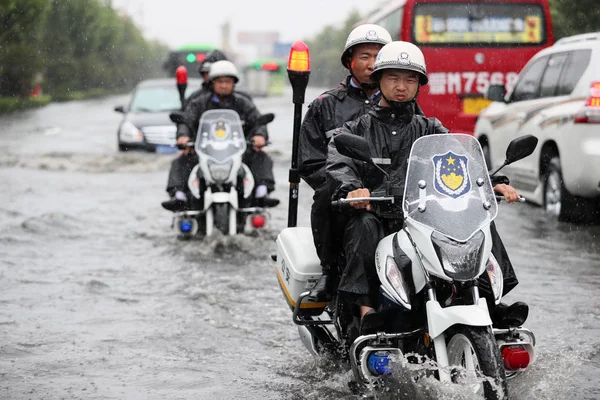 Chinese Police Officers Ride Motorcycles Patrol Seriously Flooded Road Caused — Stock Photo, Image