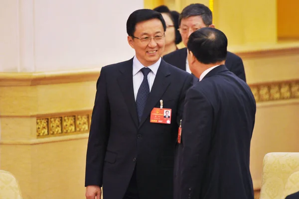 Секретарь Шанхайского Муниципального Комитета Коммунистической Партии Китая Хань Чжэн Слева — стоковое фото