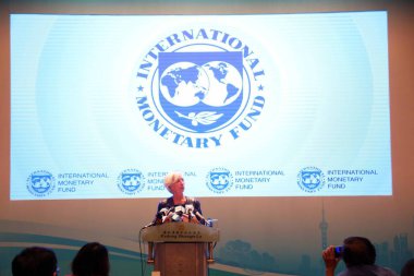 International Monetary Fund (IMF) Managing Director Christine Lagarde speaks at a press conference during the 2016 G20 Finance Ministers and Central Bank Governors Meeting in Shanghai, China, 27 February 2016 clipart