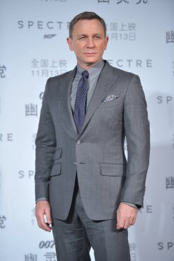 English actor Daniel Craig poses during a premiere for his movie 