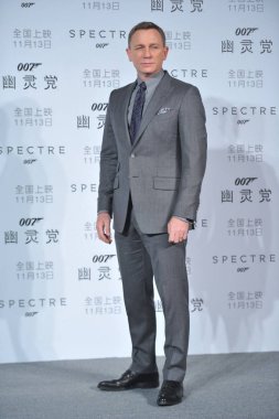 English actor Daniel Craig poses during a premiere for his movie 