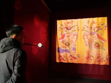 People visit the immersive digital experience exhibition at the Palace of Heavenly Purity (Qianqing gong) in the Palace Museum, also known as the Forbidden City, in Beijing, China, 23 January 2019 clipart