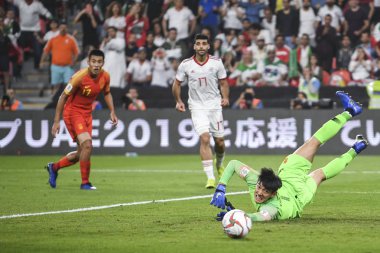 Yan Junling of China, right, tries to save the ball from Iran in their quarter-final match during the 2019 AFC Asian Cup in Abu Dhabi, United Arab Emirates, 24 January 2019 clipart