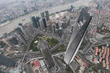 This picture taken from the Shanghai Tower under construction shows a view of Puxi, Huangpu River and the Lujiazui Financial District with the Shanghai World Financial Center, right, and the Jinmao Tower, left, and other skyscrapers and high-rise bui clipart