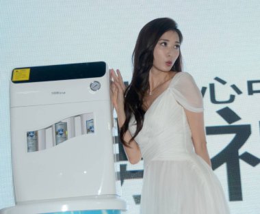 Taiwanese model and actress Lin Chi-ling attends a promotional event for Sunrain water purifiers during Aquatech China 2015 in Shanghai, China, 10 June 2015. clipart