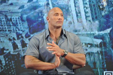 American actor Dwayne Johnson, also known by his ring name The Rock, attends a press conference for his movie 