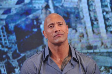 American actor Dwayne Johnson reacts during a press conference for his new movie 