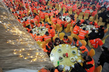 Aerial view of sanitation workers having meals on the day of traditional Chinese 