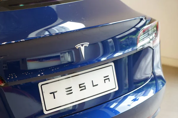 stock image A Tesla electric car is displayed at a Tesla dealership store in Shanghai, China, 9 August 2018