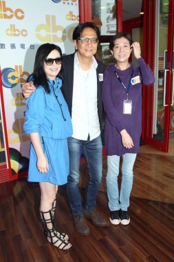 (From left) Hong Kong actress Margie Tseng, actor Anthony Chan, actress and hostess Elaine Ng pose after a recording session for Elaines talk show program at DBC radio station in Hong Kong, China, 12 May 2014. clipart