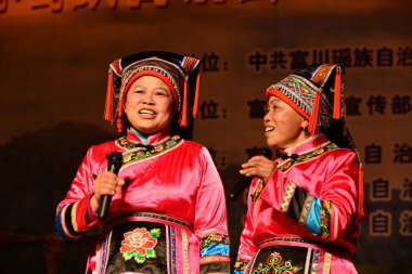 Participants of Yao ethnic minority sing at a singing event in Fuchuan Yao Autonomous County, south Chinas Guangxi Zhuang Autonomous Region, 10 February 2014 clipart