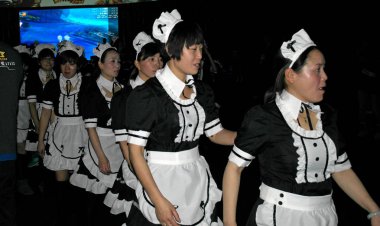 Chinese females dressed up as French maids to attend an attempt of Guinness record-breaking biggest French maid gathering held by 17173 Game in Shanghai World Financial Center in Shanghai, China, 19 January 2013 clipart