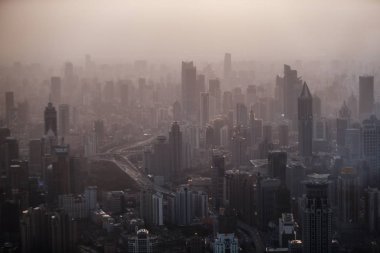 Clusters of skyscrapers and buildings are seen in smog in Shanghai, China, 2 March 2013 clipart