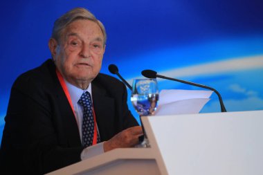 George Soros, chairman of Soros Fund Management and founder of The Open Society Institute, speaks at a sub-forum during the 2013 Boao Forum for Asia in Boao town, Qionghai city, south Chinas Hainan province, 8 April 2013. clipart