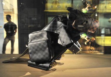 A beaver made from Louis Vuitton handbags is displayed at Wuhan International Plaza in Wuhan city, central Chinas Hubei province, 29 May 2013 clipart
