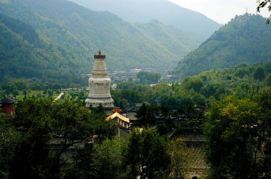 View of the Great White Pagoda for Buddhas Sarira, or Sarira Stupa, at the Tayuan Temple at Mount Wutai resort in Wutai county, Xinzhou city, north Chinas Shanxi province, August 2011. clipart